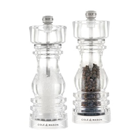 Cole & Mason clear acrylic salt and pepper mill set, shown filled with salt and peppercorns, with silver tops