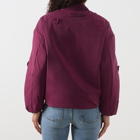 Model wearing Fabienne Chapot Hearty 3D Heart Appliqu&eacute; Bomber Jacket in Brigitte Bordeaux, back view, styled with light-wash jeans
