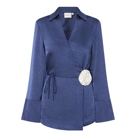 Fabienne Chapot Maritime Blue satin wrap shirt with flared sleeves, tie waist, and white floral corsage detail