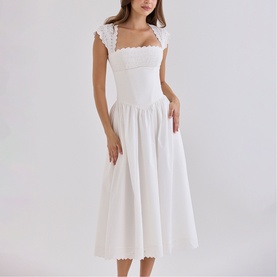 Model wearing House of CB white midi dress with lace-trimmed cap sleeves, square neckline, fitted bodice and full skirt