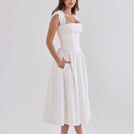 Model wearing House of CB white midi dress with square neckline, ruffle cap sleeves, fitted bodice and full pleated skirt with pockets