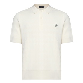 Fred Perry cream knitted polo shirt with three-button placket and embroidered laurel wreath logo on chest