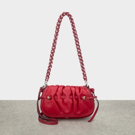 Isabel Marant scarlet red lamb leather crossbody bag with ruched front, braided chain shoulder strap, and silver-tone hardware