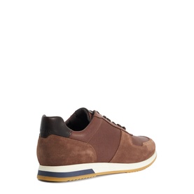 Dune brown suede and leather trainers, dark navy heel panel, white and tan layered sole, rear three-quarter view