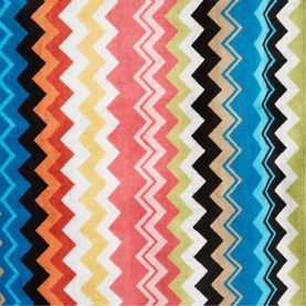 Missoni Bath Towelling in multicolour zigzag stripe pattern, featuring bold bands of blue, coral, yellow, black and white.