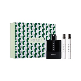 Prada Luna Rossa Black fragrance gift set with large black bottle, two travel sprays, and green geometric-print gift box