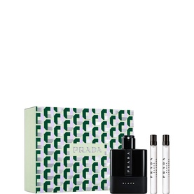 Prada Luna Rossa Black fragrance gift set with large black bottle, two travel sprays, and green geometric-print gift box