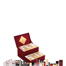 Red and gold two-tier advent calendar box, open to reveal compartments, displayed with an array of makeup and skincare miniatures