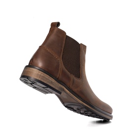 Brown leather Chelsea boot with elasticated side gusset, pull tab, and chunky dark rubber sole, shown at an angle