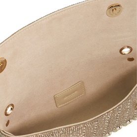 Dune gold bag interior showing suede lining, gold eyelet trim, and embossed logo tab.