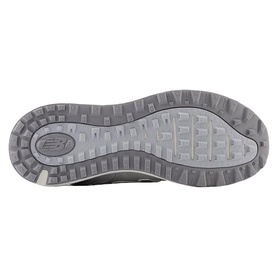 New Balance Golf women's golf shoe in light grey, sole view showing textured traction pattern and branded heel detail