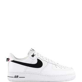 Nike Air Force 1 low-top trainer in white with black Swoosh, AIR branding on midsole, white rubber sole