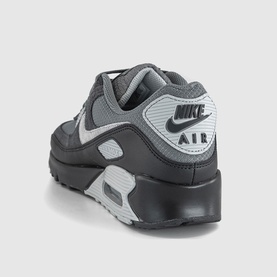 Nike Air Max 90 trainer in dark grey and cool grey, leather and mesh upper, black rubber sole, visible AIR heel unit