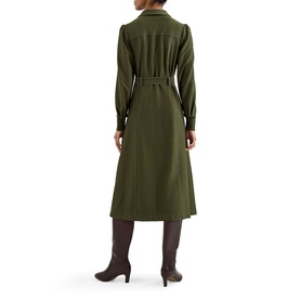 Model wearing Phase Eight green midi shirt dress with belt, styled with dark brown knee-high boots. Rear view.
