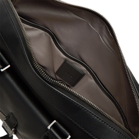 Calvin Klein Commuter Logo Briefcase in black, showing brown fabric interior lining and two-way zip-around fastening detail with gunmetal hardware.