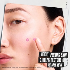 Kiehl's Collagen Serum lifestyle shot showing two drops of serum applied to model's cheekbone with claim text overlay