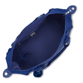 Kipling blue nylon tote bag, open top-down view showing blue zip, interior lining, and signature monkey keychain.