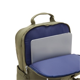 Kipling Almost Sage green backpack open to reveal blue interior lining and padded laptop compartment with silver laptop inside.