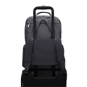 Dark grey backpack with luggage pass-through sleeve, shown mounted on a rolling suitcase, zip pockets and top carry handle visible