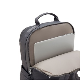 Black backpack with open main compartment showing padded laptop sleeve, silver zip hardware and carry handle