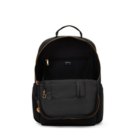 Kipling black backpack open showing spacious grey interior with multiple compartments and gold-tone zip hardware