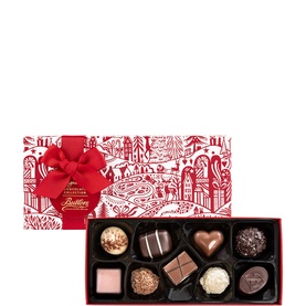 Butlers Christmas chocolate gift box, red festive illustrated lid with bow, open to reveal 8 assorted milk and dark chocolates