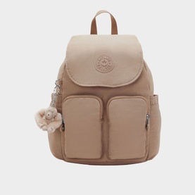 Kipling sand-toned nylon backpack with flap closure, two front zip pockets, brown top handle, and signature monkey keychain charm