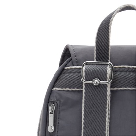 Close-up of grey nylon backpack showing silver buckle hardware and striped webbing strap detail with contrast stitching