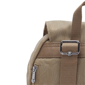 Close-up of a beige textured nylon backpack showing top handle, silver hardware clip, and zip pocket detail.