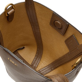 Chlo&eacute; Smoked Brown leather tote bag interior view, showing tan suede lining, magnetic snap closure and gold-tone hardware ring