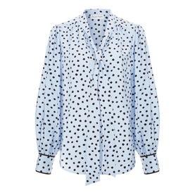 Phase Eight blue polka dot blouse with tie neck, long sleeves and contrast cuff trim, laid flat