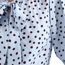 Phase Eight blue polka dot dress with burgundy spots, tie-neck detail and long sleeves, close-up view