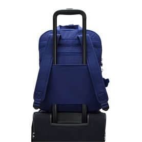 Blue backpack with padded back panel and adjustable straps, shown mounted on a wheeled suitcase trolley handle