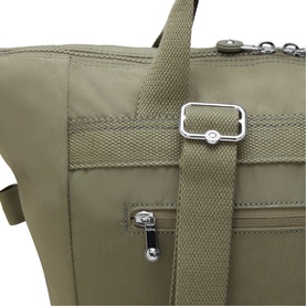 Close-up of khaki nylon bag showing silver-tone buckle hardware, adjustable strap, and zip pocket detail