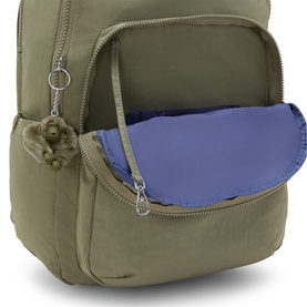 Kipling Almost Sage green backpack with open main compartment revealing blue padded laptop sleeve, silver-tone zips and monkey keyring.