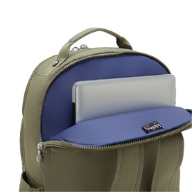 Kipling backpack in Almost Sage, open to reveal blue padded laptop compartment with device inside and silver zip detail.