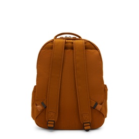 Tan backpack rear view, padded adjustable shoulder straps, top carry handle, and zip closure