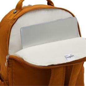 Kipling amber yellow backpack interior showing padded laptop sleeve compartment with silver zipper detail