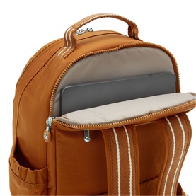 Kipling backpack in Stylish Mokka tan, open to reveal padded laptop compartment with cream striped interior lining.