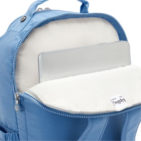 Kipling Vintage Blue backpack open top view showing padded laptop compartment with silver zipper detail and white lining.