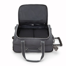 Kipling grey soft-shell wheeled cabin bag, open to show divided interior compartment, carry handles and spinner wheels visible