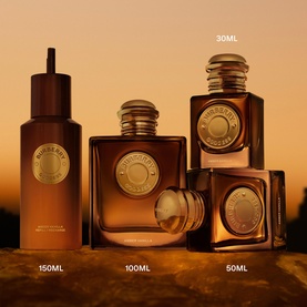 Burberry EDP fragrance collection in amber glass bottles, shown in three sizes: 50ml, 100ml and 150ml refill, warm golden tones