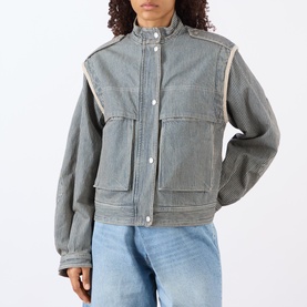 Model wearing Isabel Marant Etoile multi cotton jacket with contrast piping trim, chest patch pockets, styled with light blue jeans