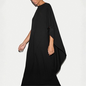 Model wearing Jigsaw black oversized maxi dress with wide draped sleeves and round neckline
