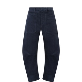 Nili Lotan Shon Barrel-Leg Trousers in Service Blue, mid-rise with front patch pockets, seamed knees and zip fly fastening