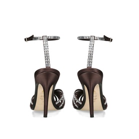 Dark brown satin stiletto sandals with crystal-embellished ankle strap and heel detail, shown from rear angle on slim high heel