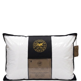The Lyndon Company white pillow with black branded packaging band and gold logo label