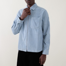 Model wearing Belstaff Mist Blue casual shirt with zip front, chest pocket and small logo badge on sleeve