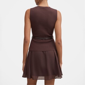 Model wearing Forever New chocolate sleeveless mini dress with belted waist and chiffon skirt, rear view