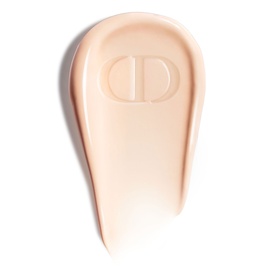 Dior makeup primer shown as a cream swatch with embossed CD logo detail in a pale nude tone